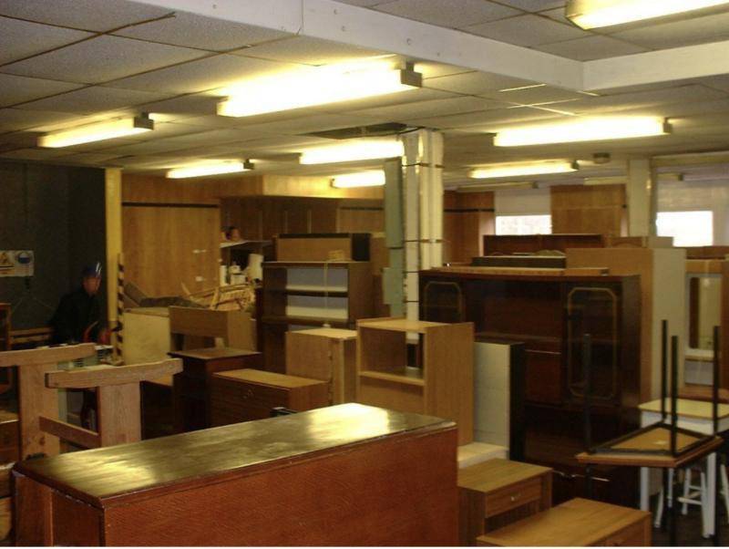 Rows of donated furniture in the Open Door warehouse
